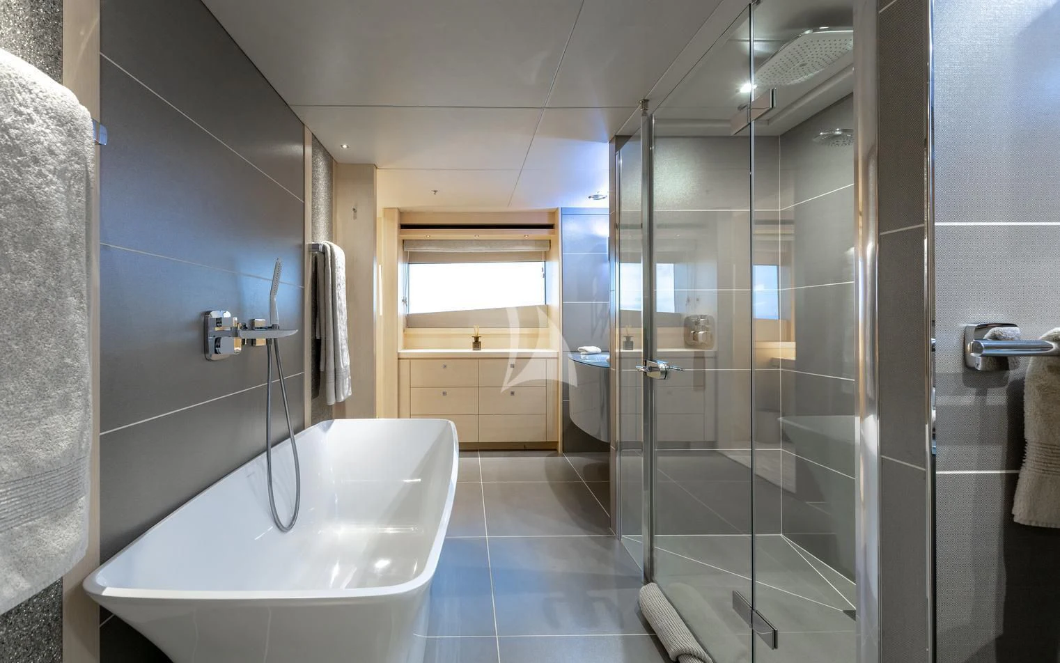 a bathroom with a glass shower aboard ARADOS Yacht for Charter