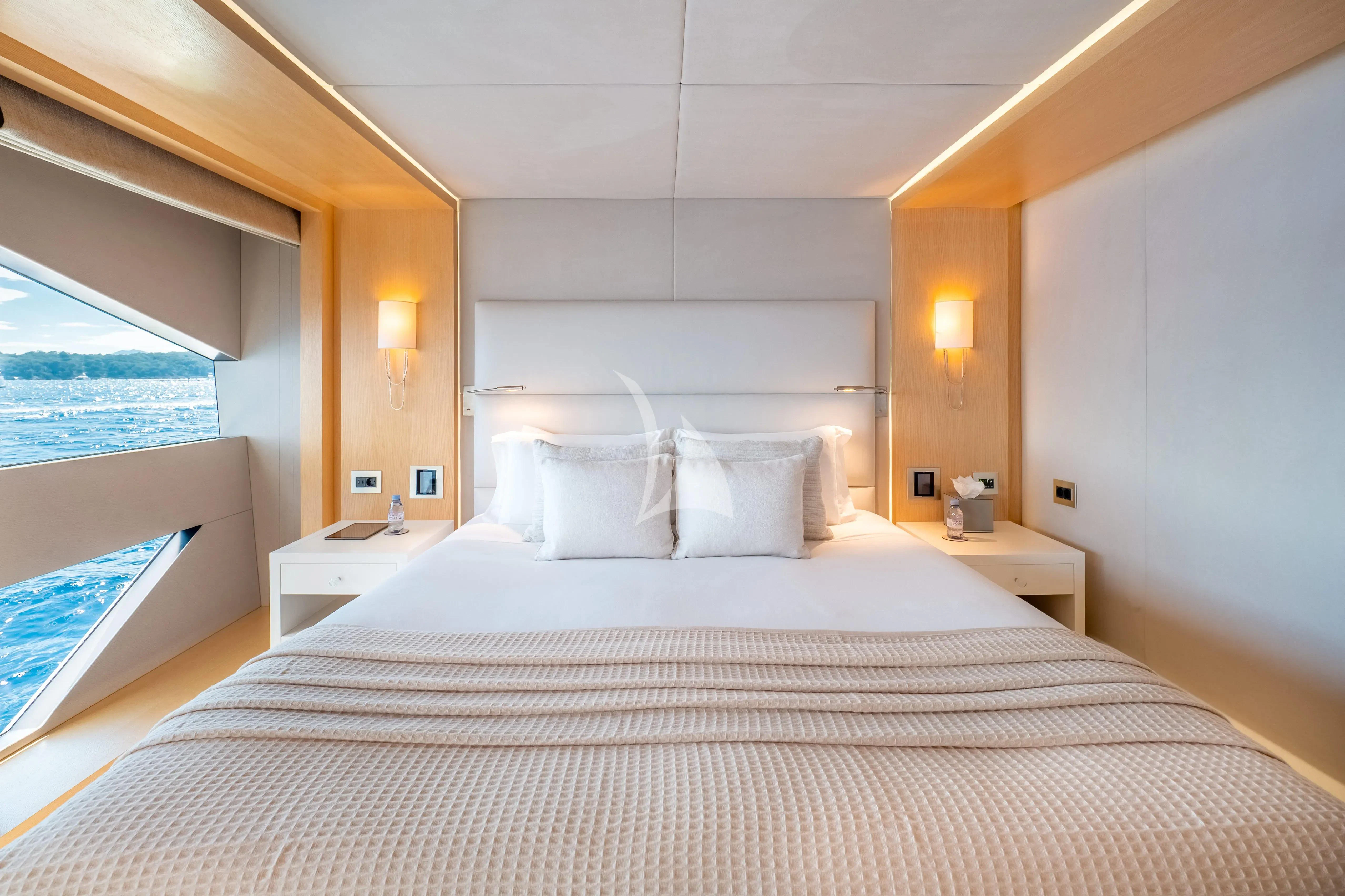 a large bed in a room aboard ARADOS Yacht for Charter