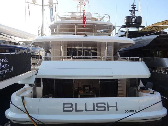 a couple of boats in a harbor aboard ARADOS Yacht for Charter