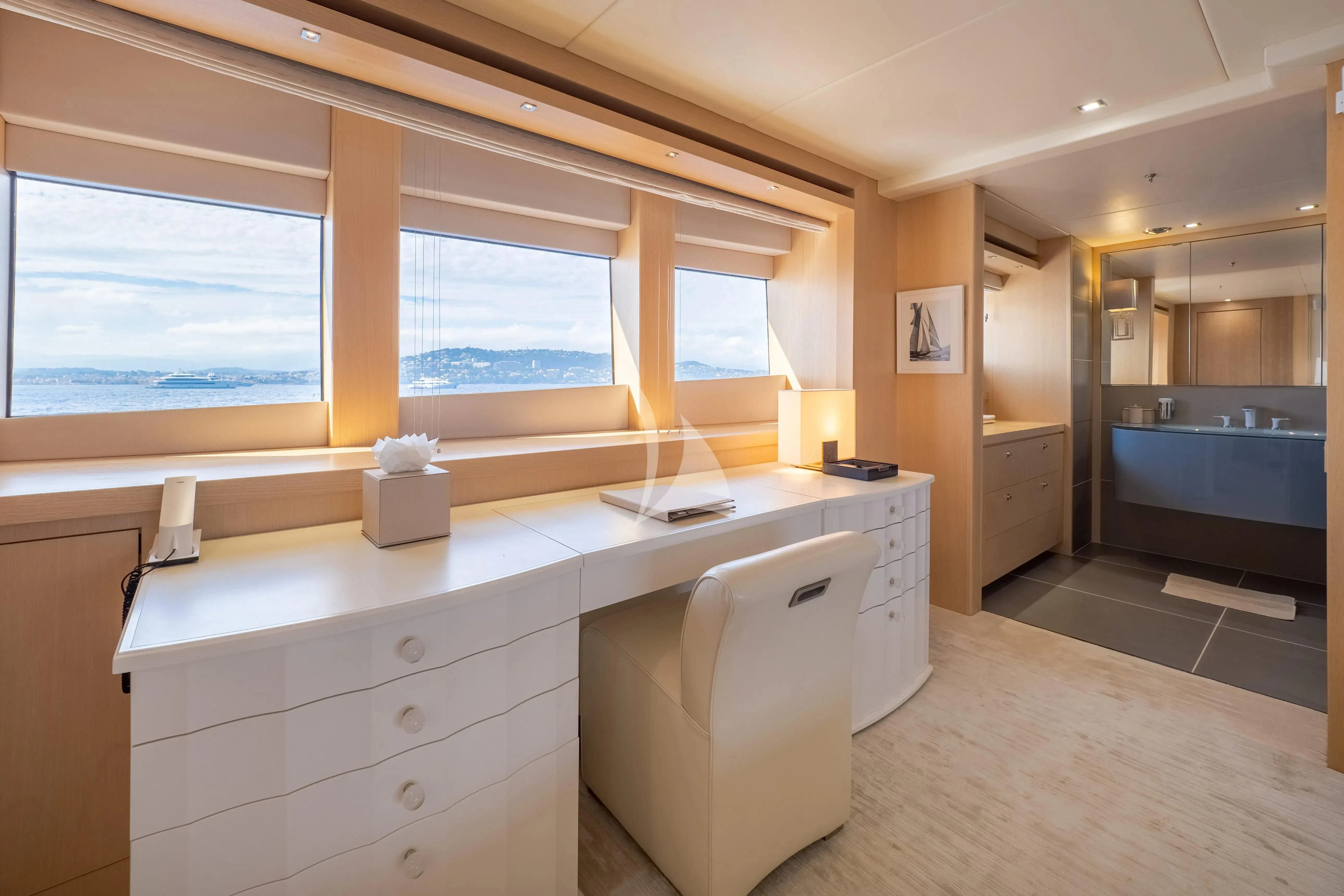 a bathroom with a sink and cabinets aboard ARADOS Yacht for Charter