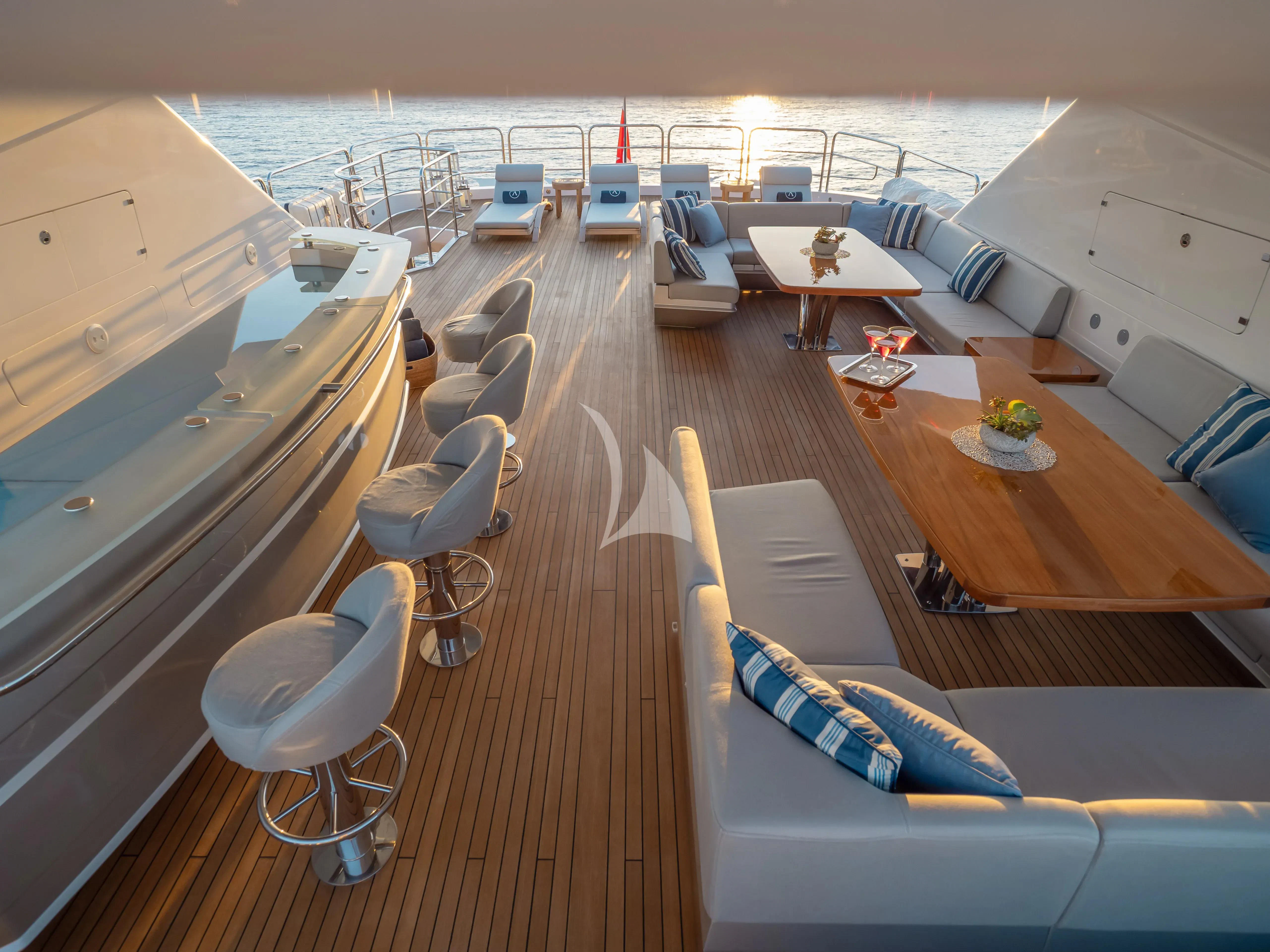 a deck with a view of the ocean and the deck aboard ARADOS Yacht for Charter