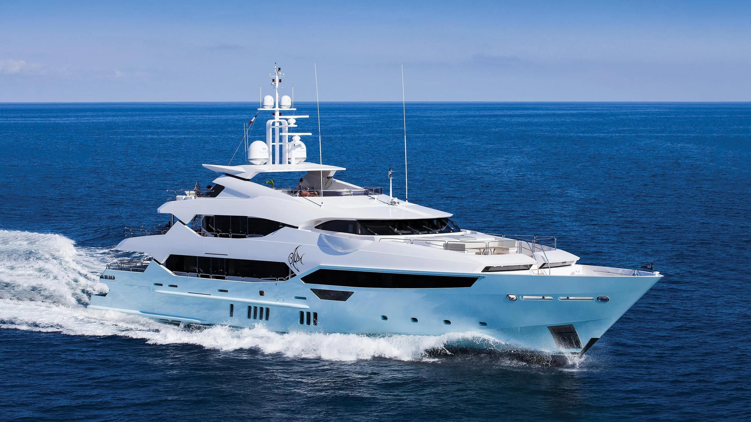 a white yacht in the water aboard ARADOS Yacht for Charter