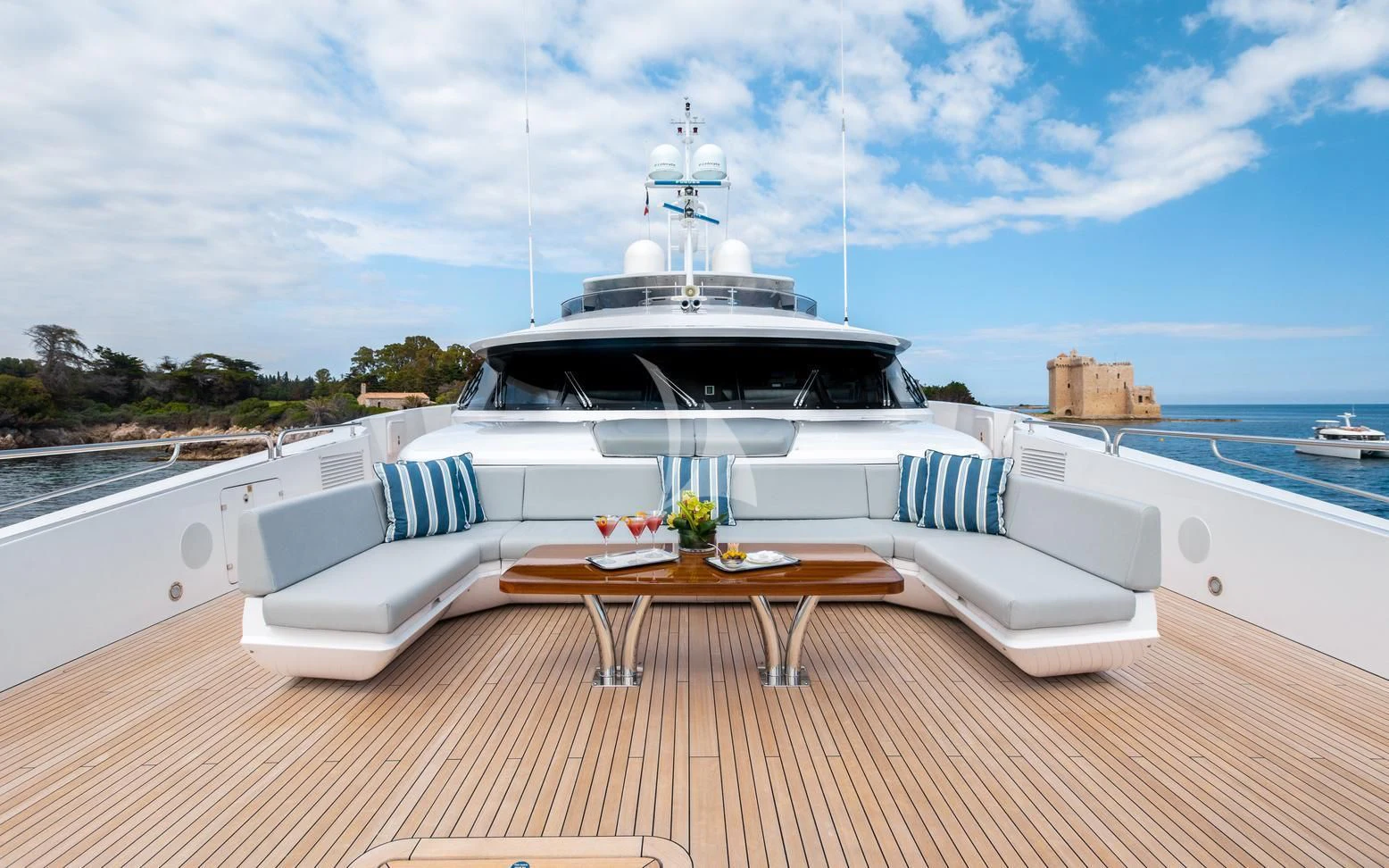 a white boat on a boat aboard ARADOS Yacht for Charter