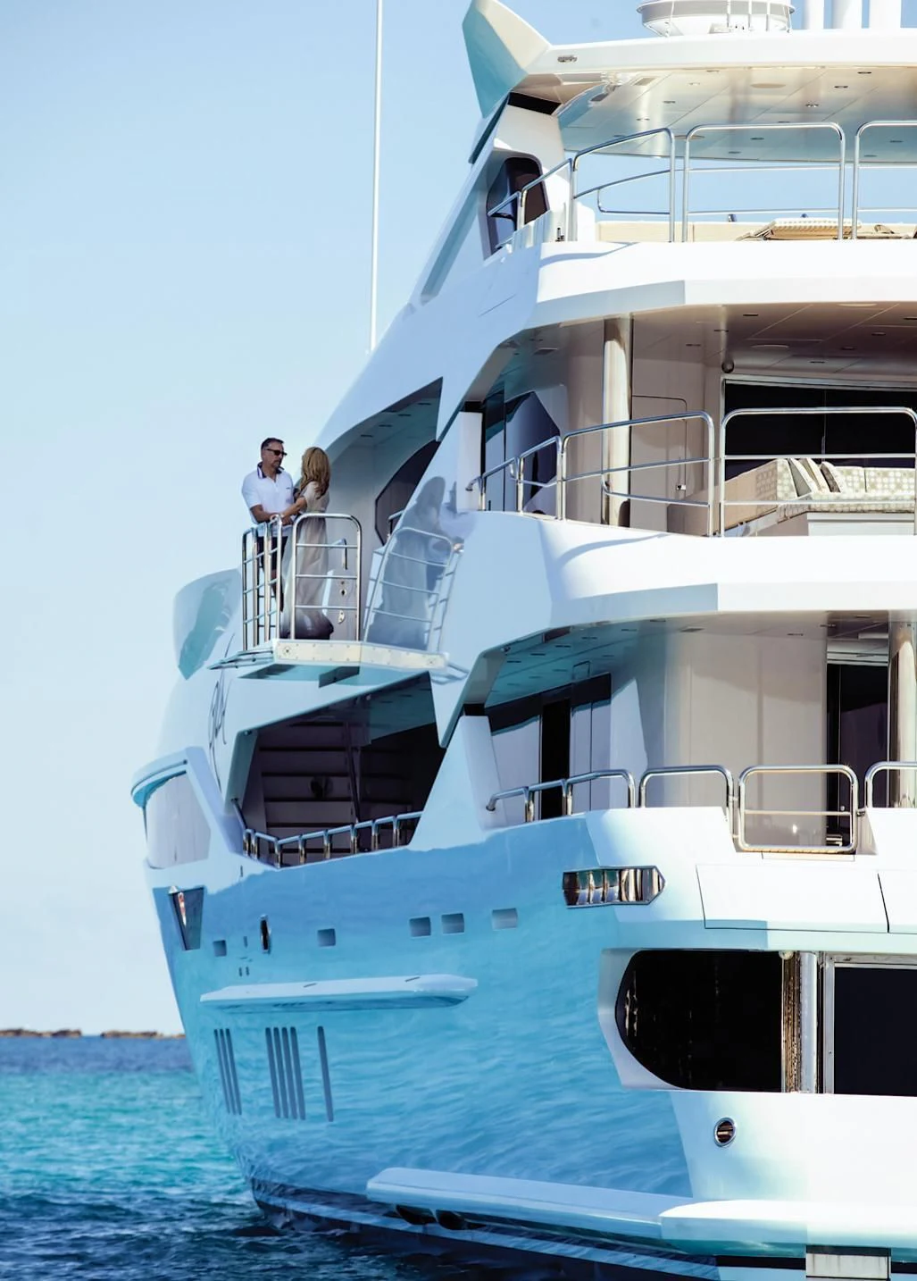 a couple of people on a boat aboard ARADOS Yacht for Charter