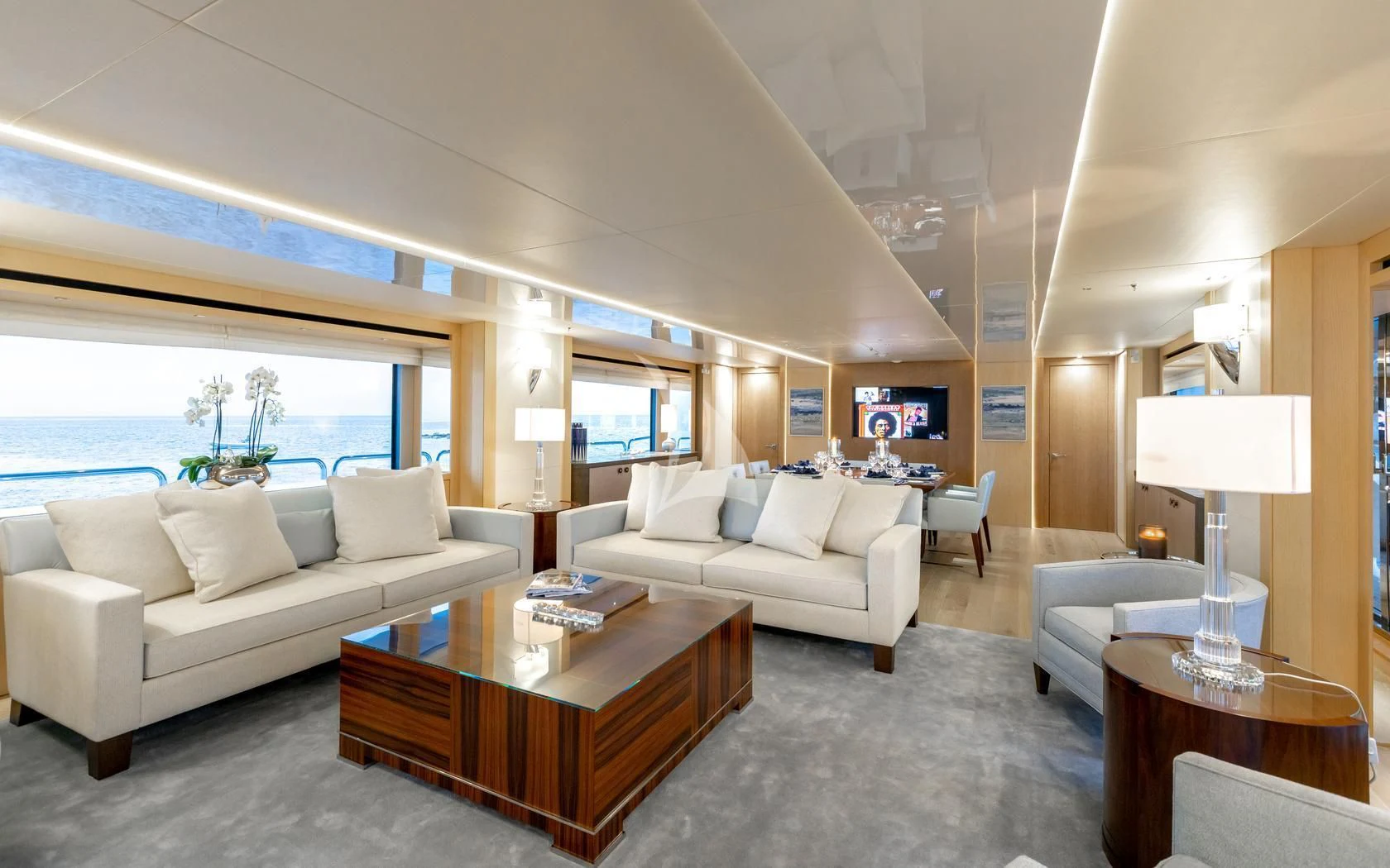 a living room with a large window aboard ARADOS Yacht for Charter