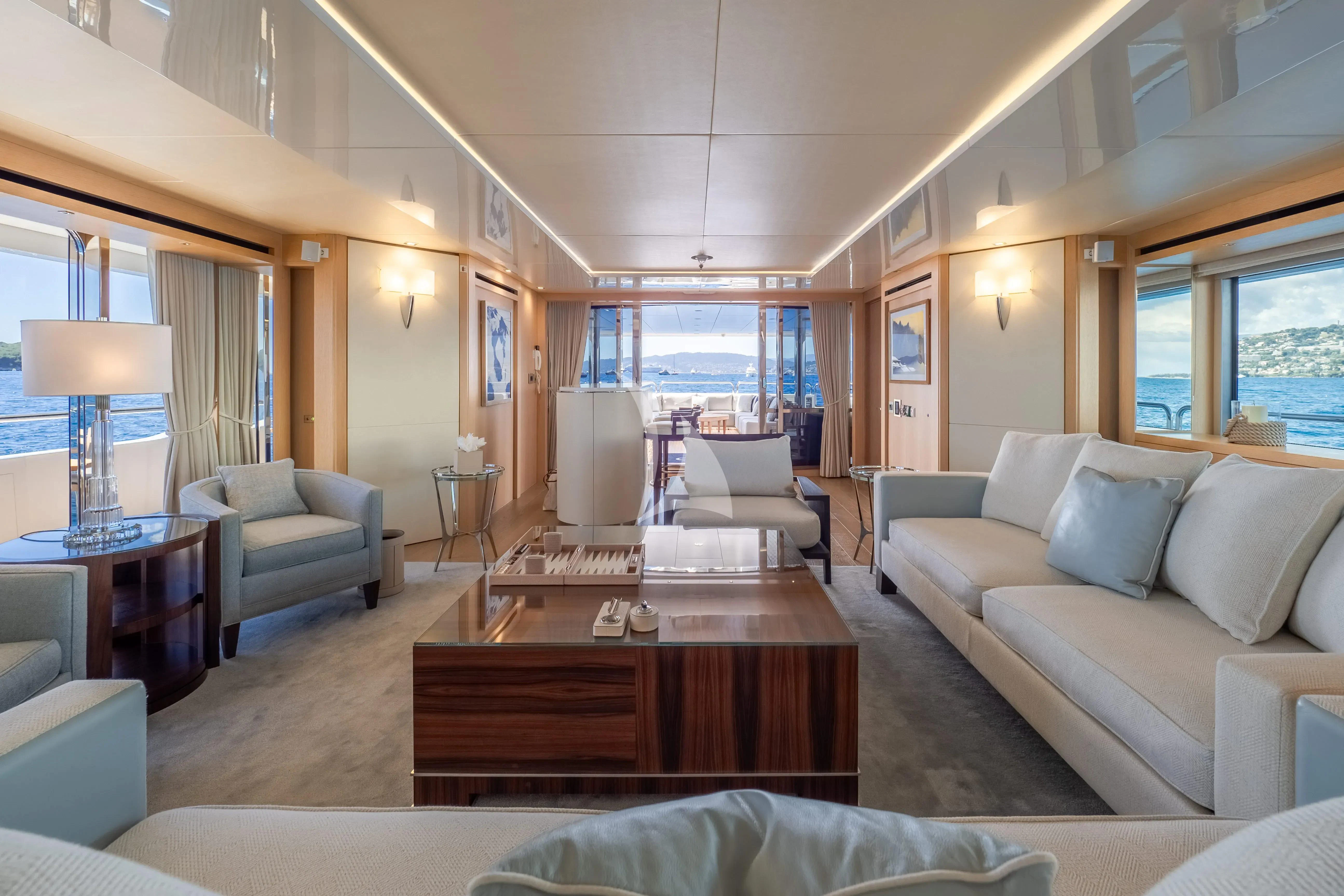 a living room with a couch and a coffee table aboard ARADOS Yacht for Charter