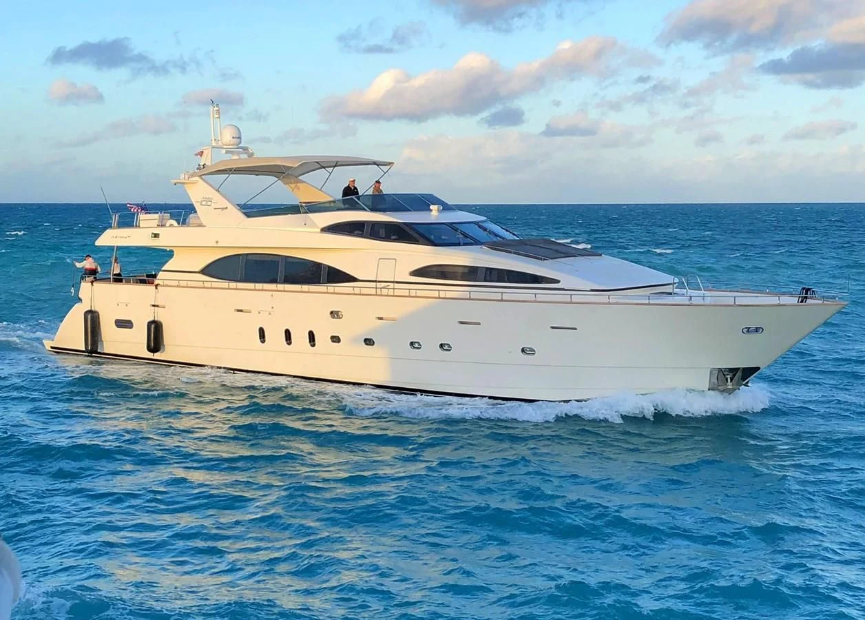 a white yacht in the water aboard REFLECTION Yacht for Sale