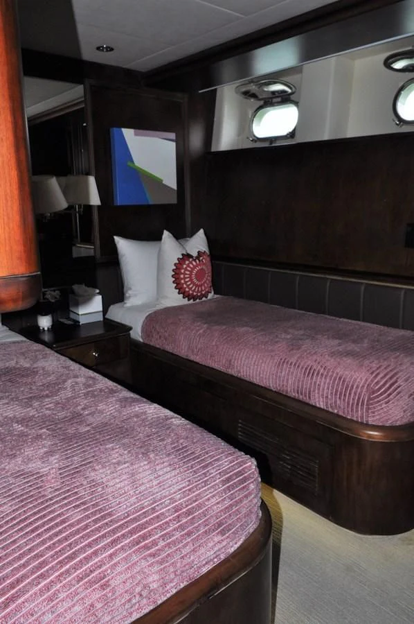 a couple of beds in a hotel room aboard REFLECTION Yacht for Sale