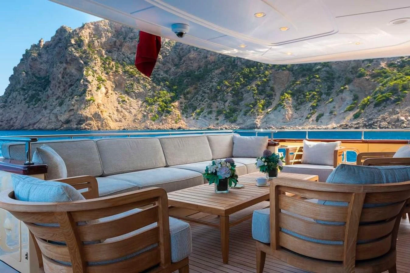 a room with a table and chairs aboard 2011 SANLORENZO SD92 FLYBRIDGE Yacht for Sale