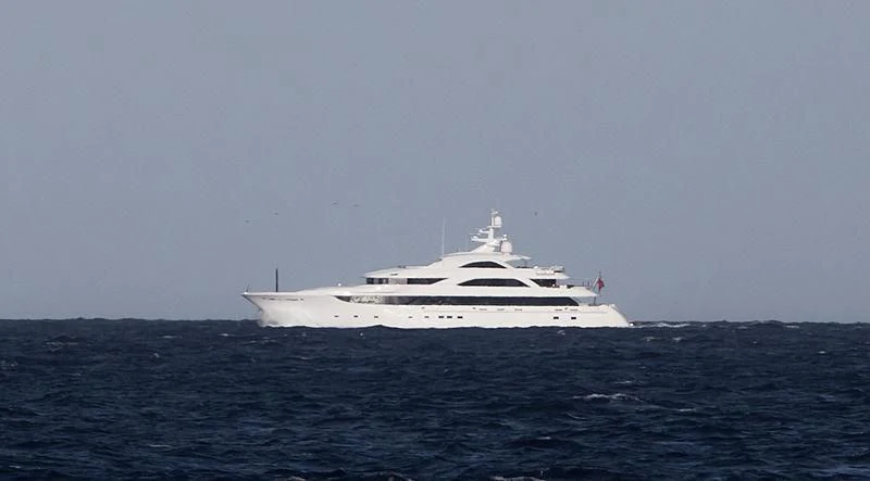 a white yacht in the water aboard SATORI Yacht for Sale