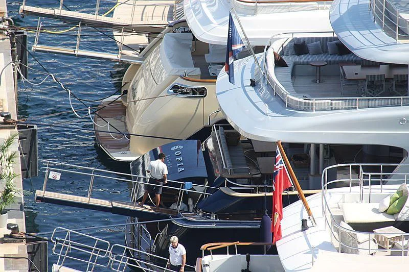 a boat docked with several people aboard SOFIA 3 Yacht for Sale