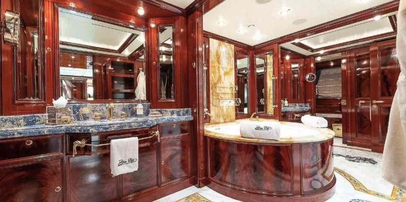 a bathroom with a sink and cabinets aboard BEOL Yacht for Sale
