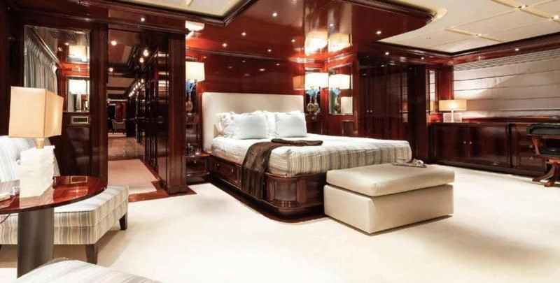 a room with a bed and a table aboard BEOL Yacht for Sale