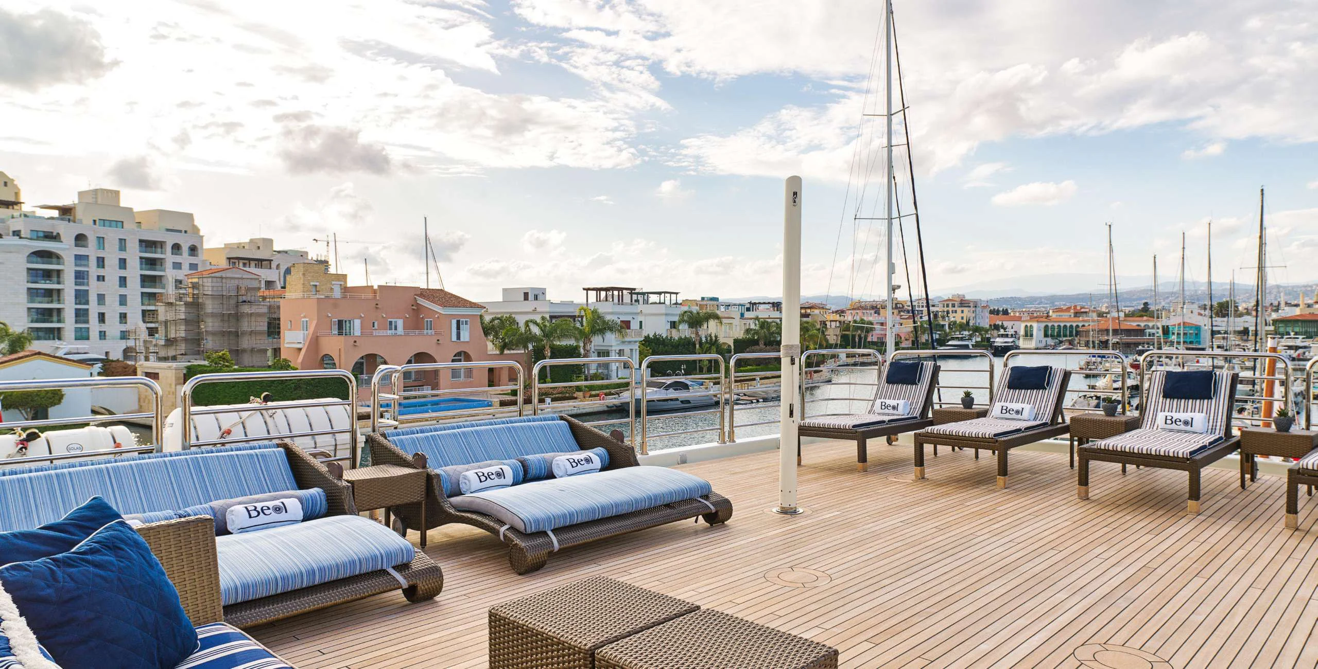a deck with chairs and a pool aboard BEOL Yacht for Sale
