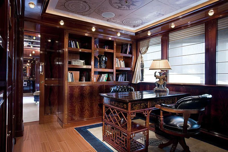 a room with a table and chairs aboard BEOL Yacht for Sale