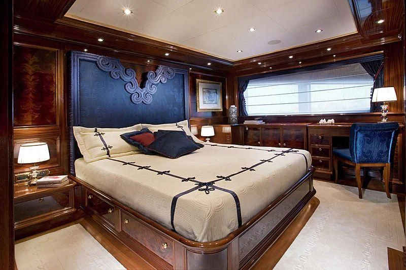 a large bed in a room aboard BEOL Yacht for Sale