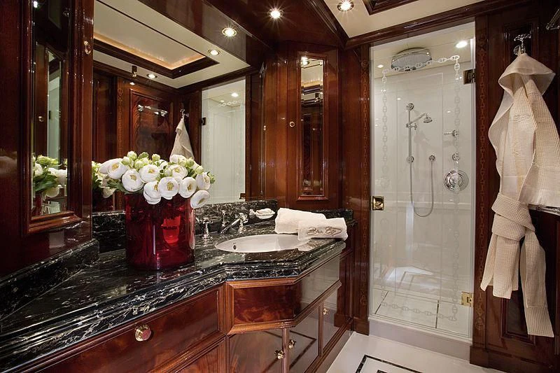 a bathroom with a large mirror aboard BEOL Yacht for Sale