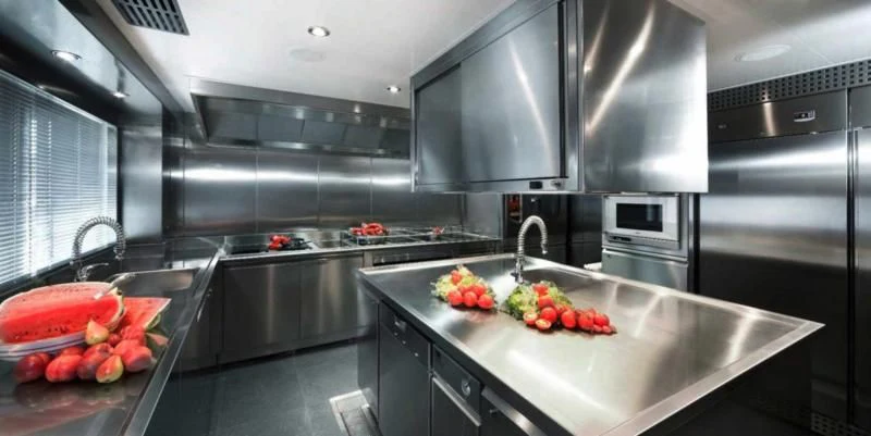 a kitchen with stainless steel appliances aboard BEOL Yacht for Sale