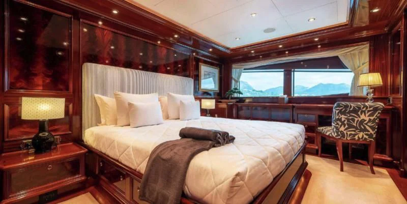 a room with a bed and a desk aboard BEOL Yacht for Sale