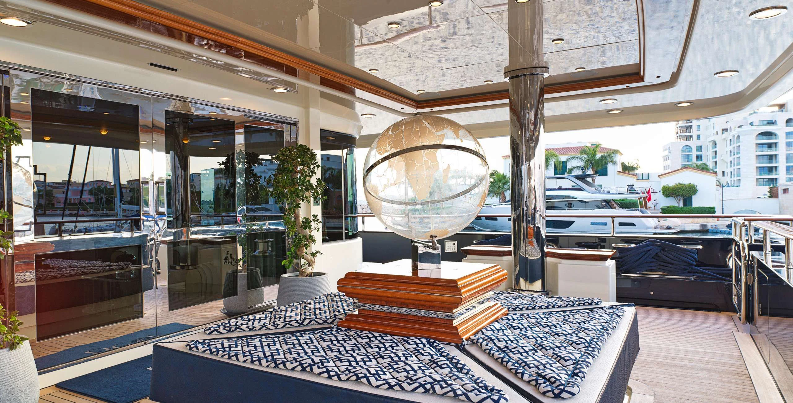 a large globe in a room aboard BEOL Yacht for Sale