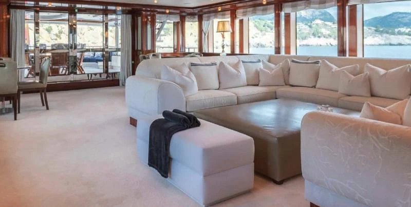 a living room with a large window aboard BEOL Yacht for Sale