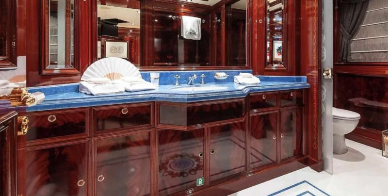 a bathroom with a countertop sink and cabinets aboard BEOL Yacht for Sale