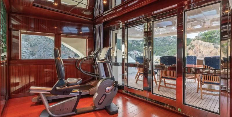 a treadmill in a room aboard BEOL Yacht for Sale