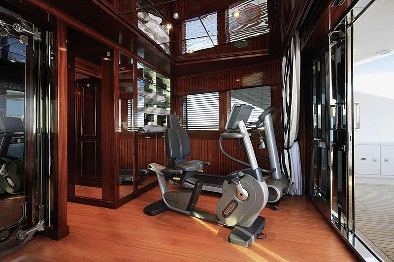 a gym with exercise equipment aboard BEOL Yacht for Sale