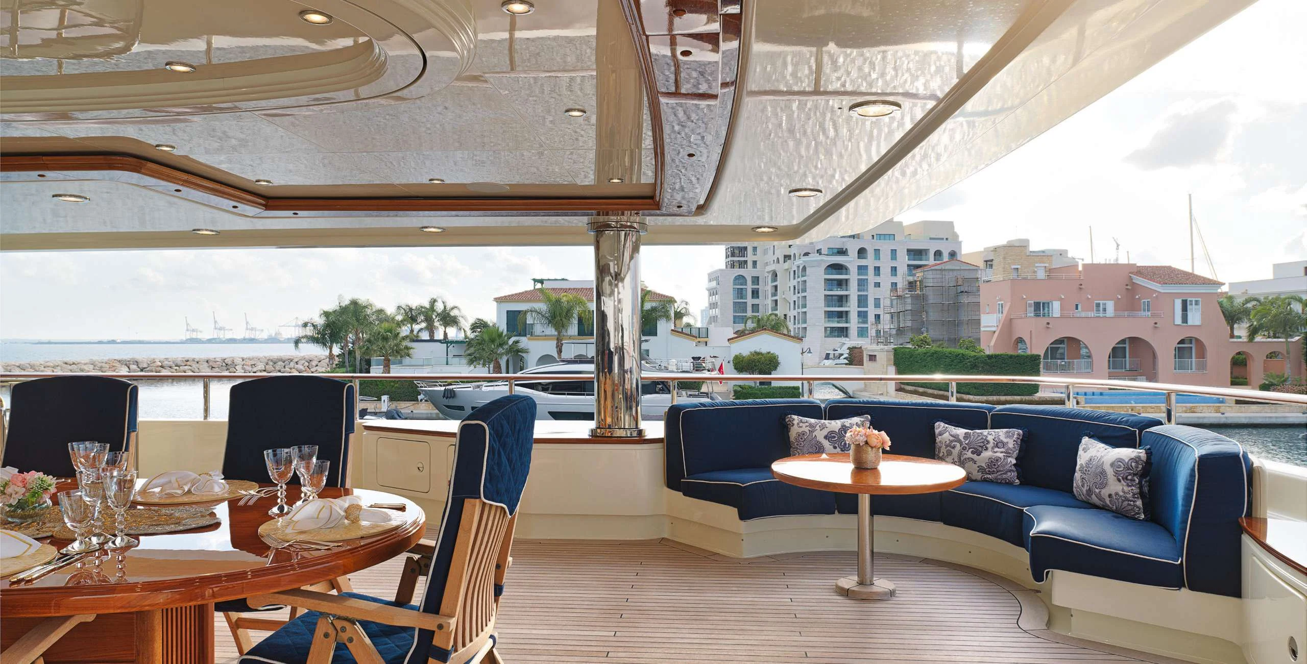 a room with a couch and a table and chairs aboard BEOL Yacht for Sale