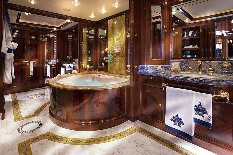 a large bathroom with a large marble sink aboard BEOL Yacht for Sale