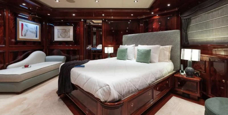 a room with a bed and a couch aboard BEOL Yacht for Sale
