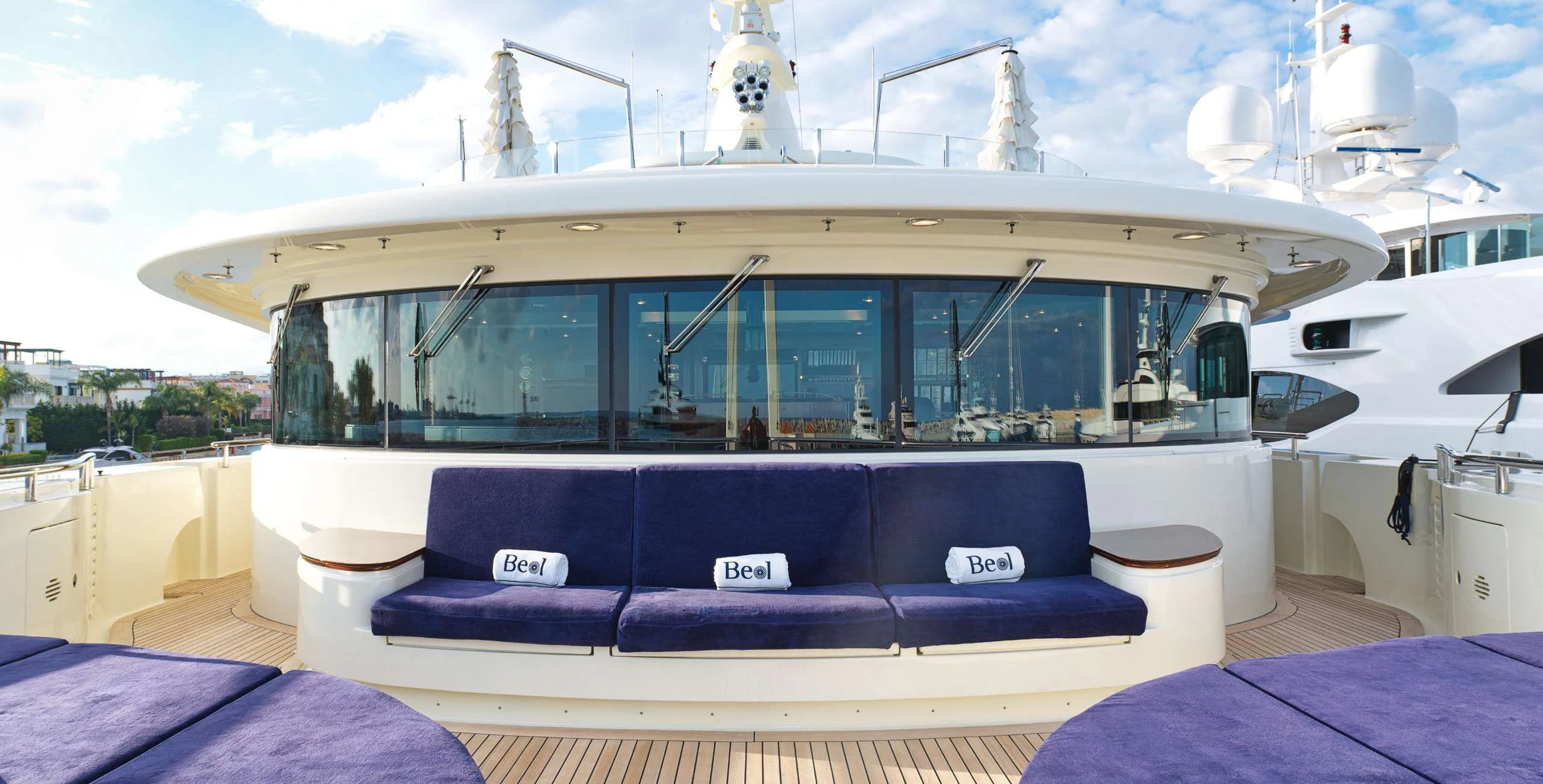 a boat with a blue cover aboard BEOL Yacht for Sale