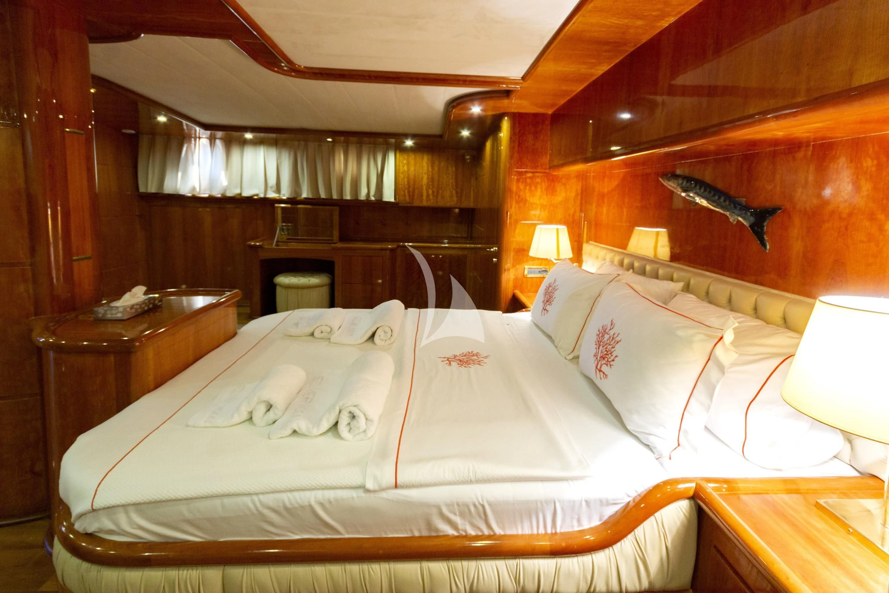 a bed with white sheets aboard SILVER MOON Yacht for Sale