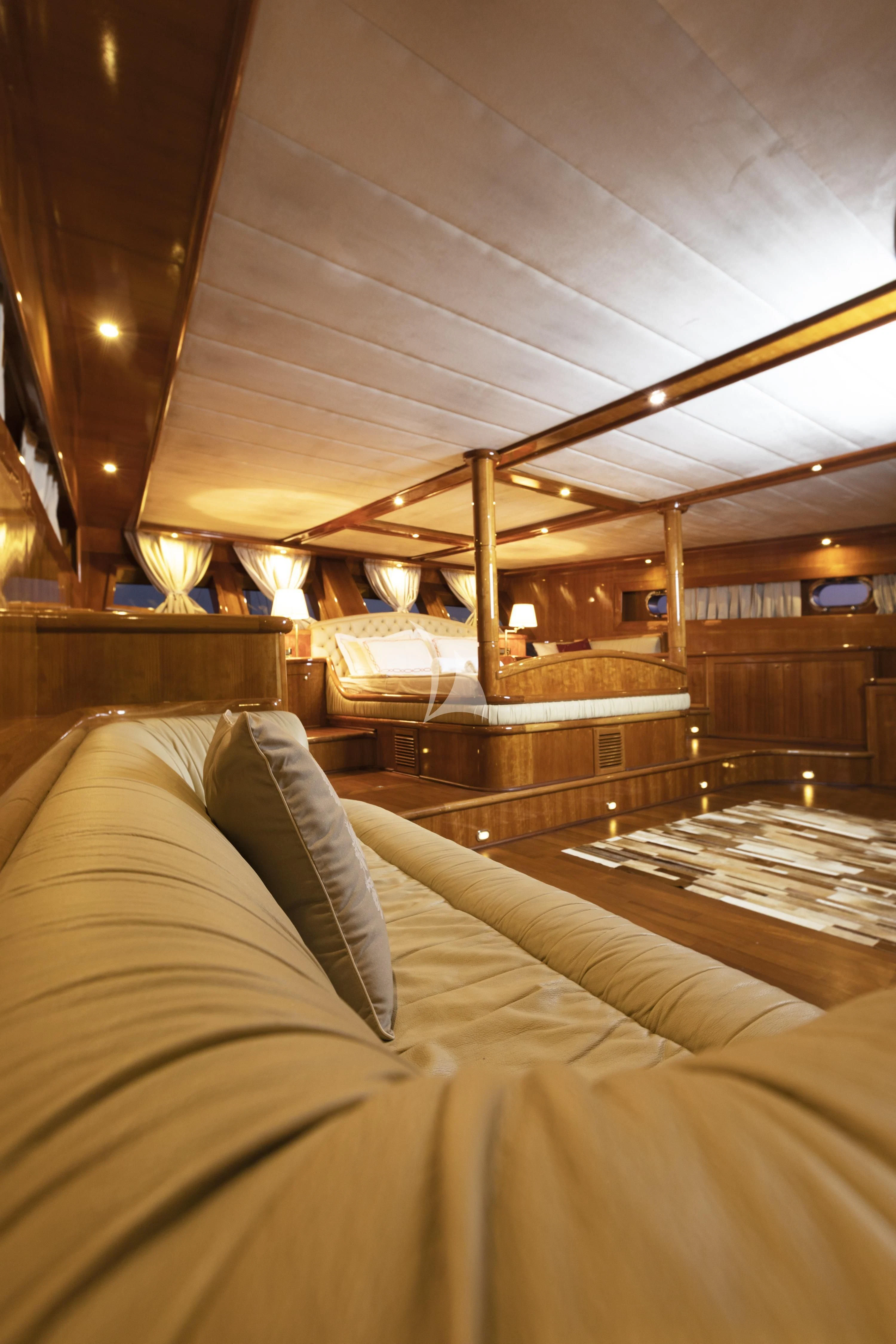 a bed with a canopy aboard SILVER MOON Yacht for Sale