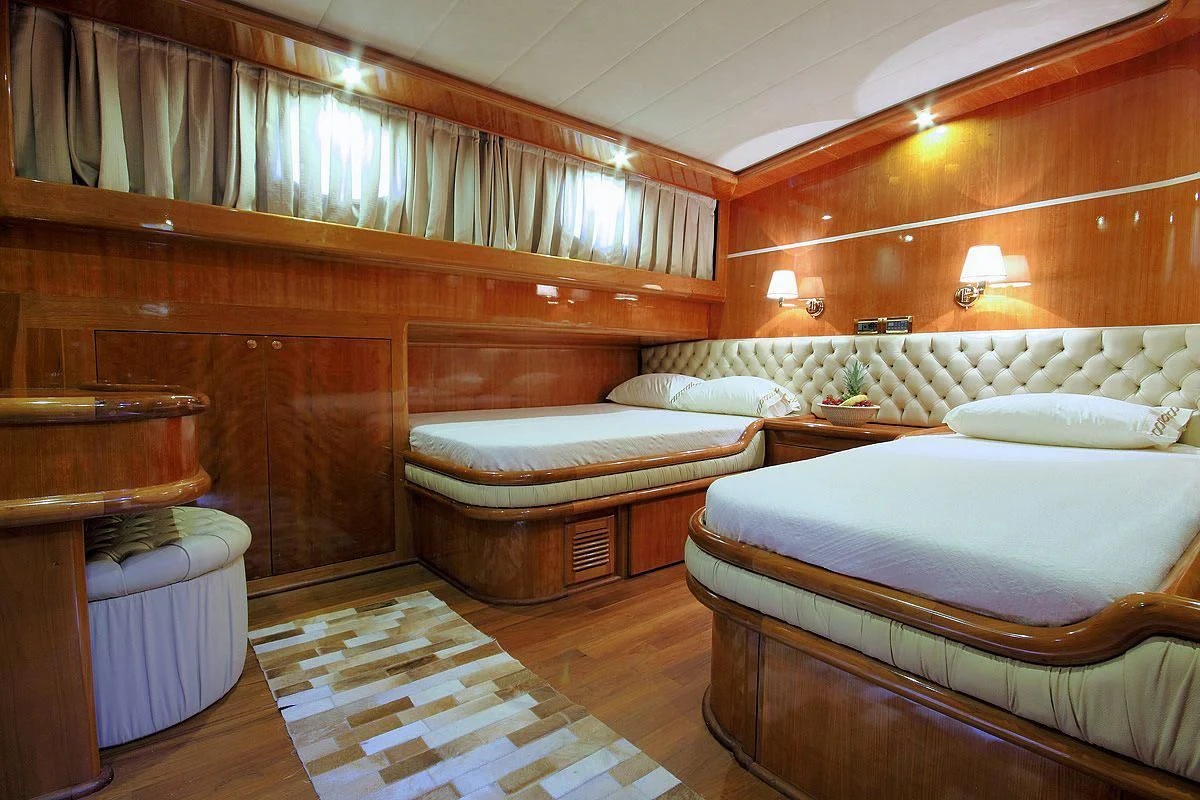 a room with two beds aboard SILVER MOON Yacht for Sale