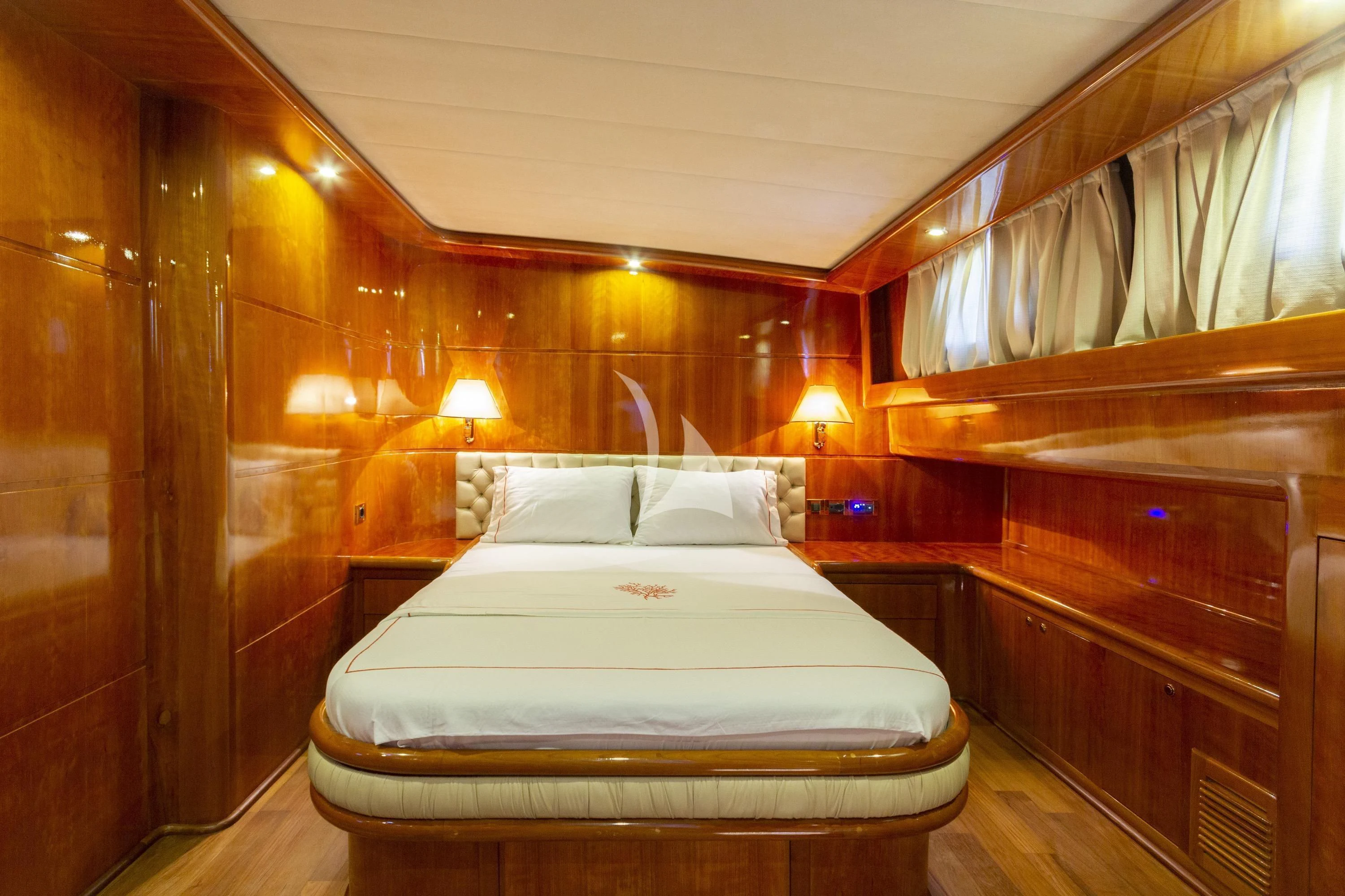 a bed in a room aboard SILVER MOON Yacht for Sale