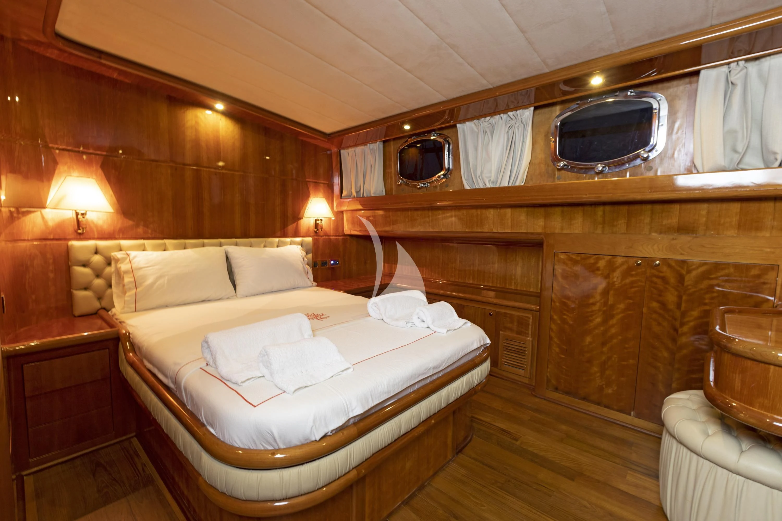 a room with a bed and a mirror aboard SILVER MOON Yacht for Sale