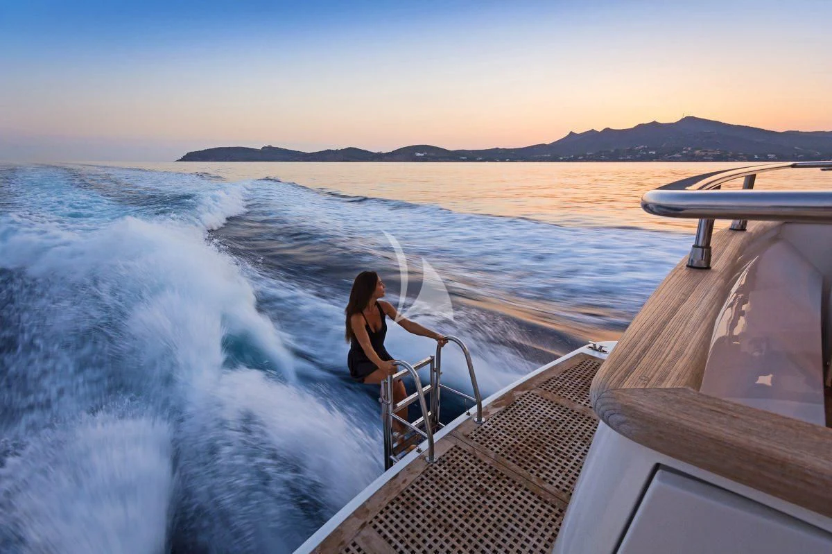 a person sitting on a boat aboard SILVER MOON Yacht for Sale