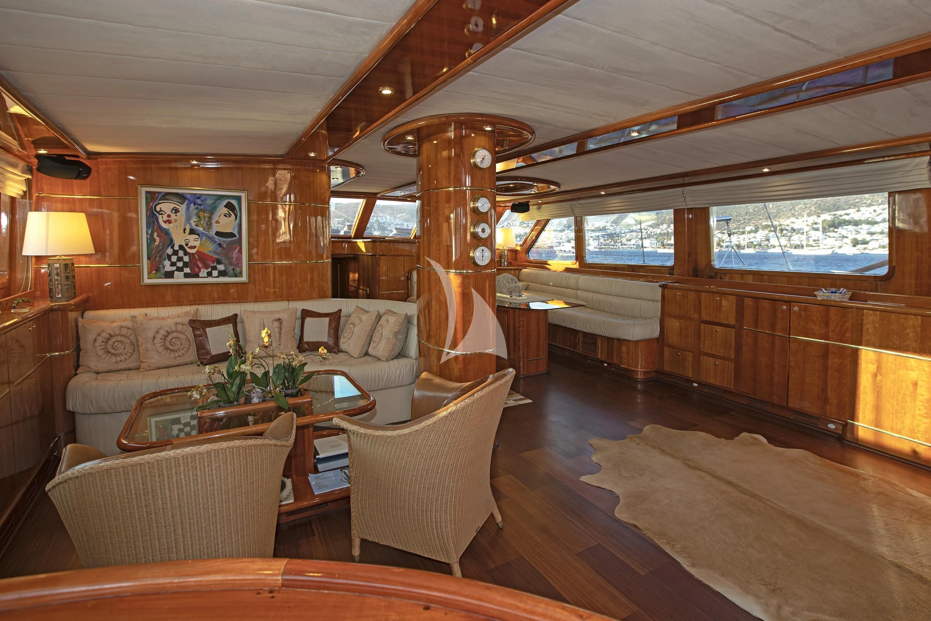 a living room with a wood floor aboard SILVER MOON Yacht for Sale