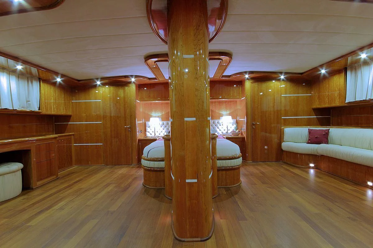 a large room with a fireplace aboard SILVER MOON Yacht for Sale