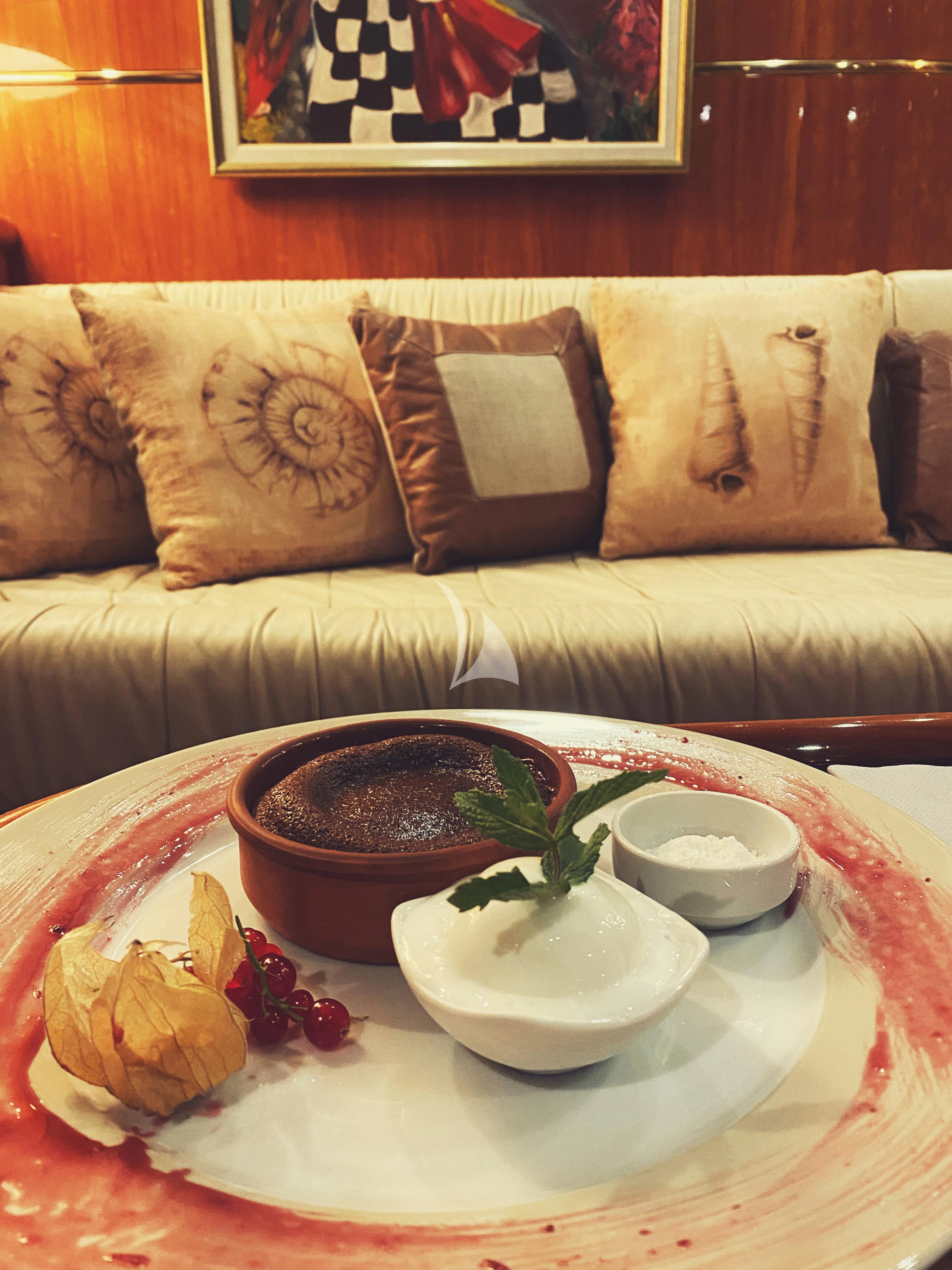 a bowl of food on a table aboard SILVER MOON Yacht for Sale