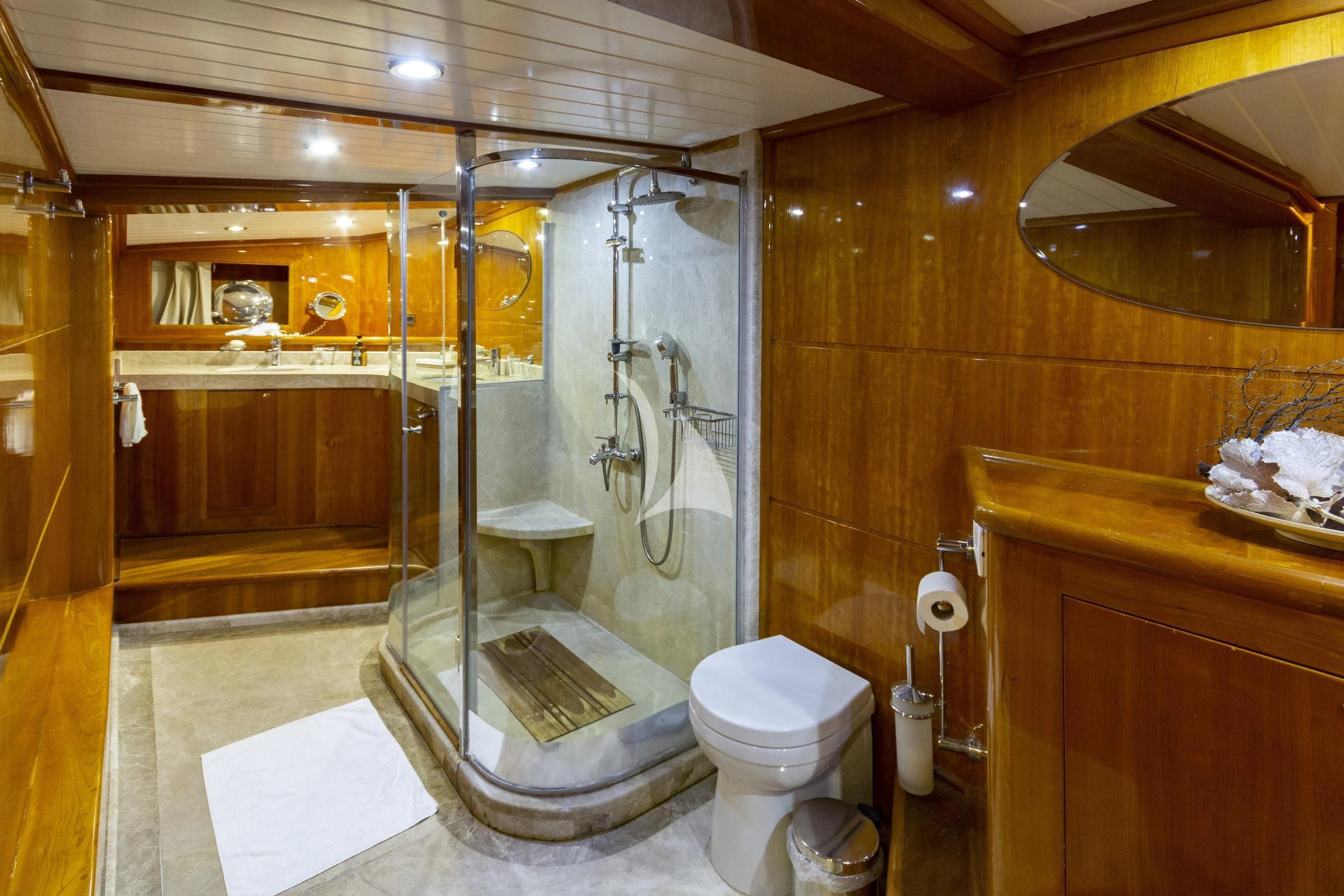 a bathroom with a glass shower aboard SILVER MOON Yacht for Sale