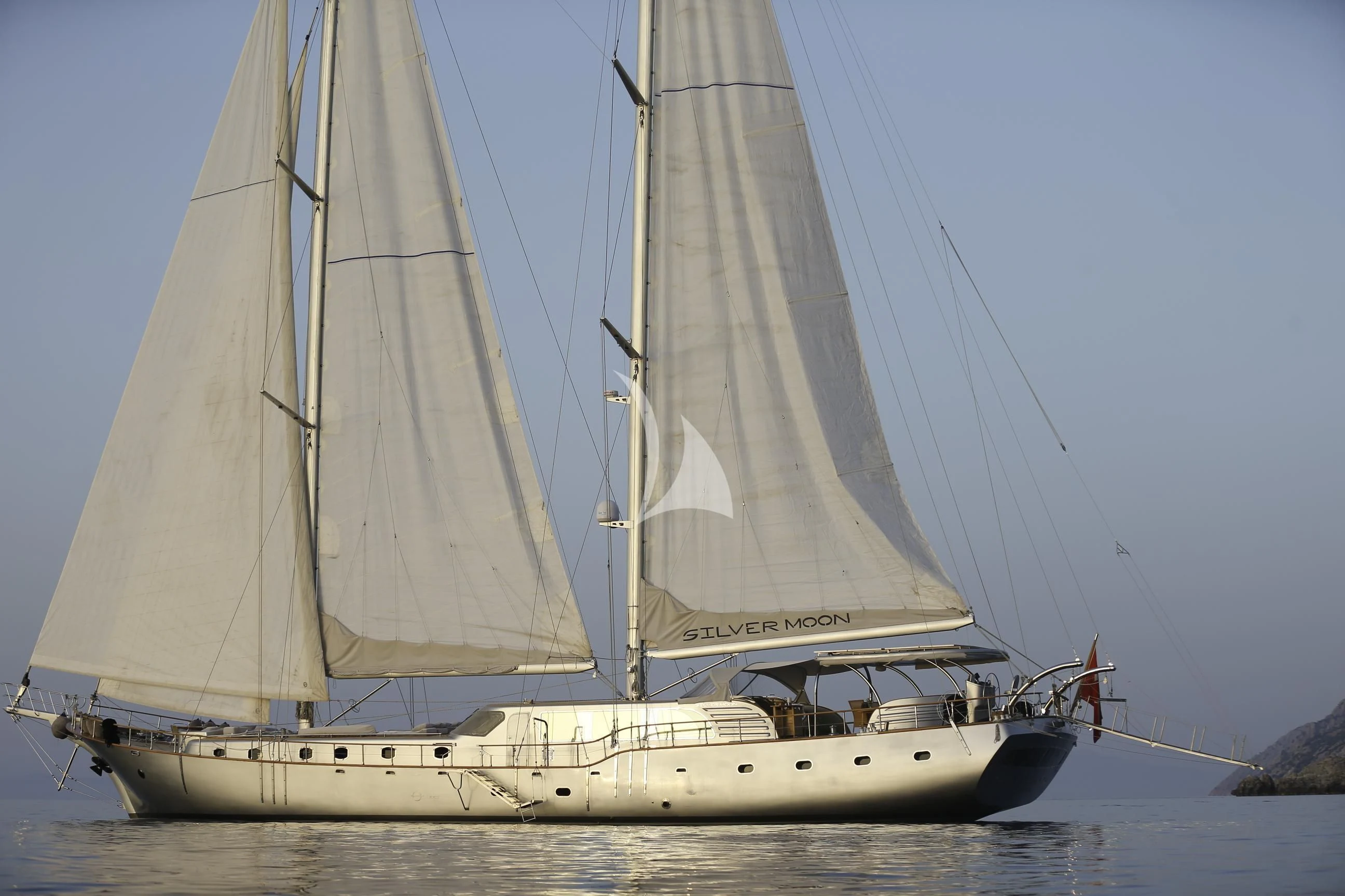 a sailboat on the water aboard SILVER MOON Yacht for Sale