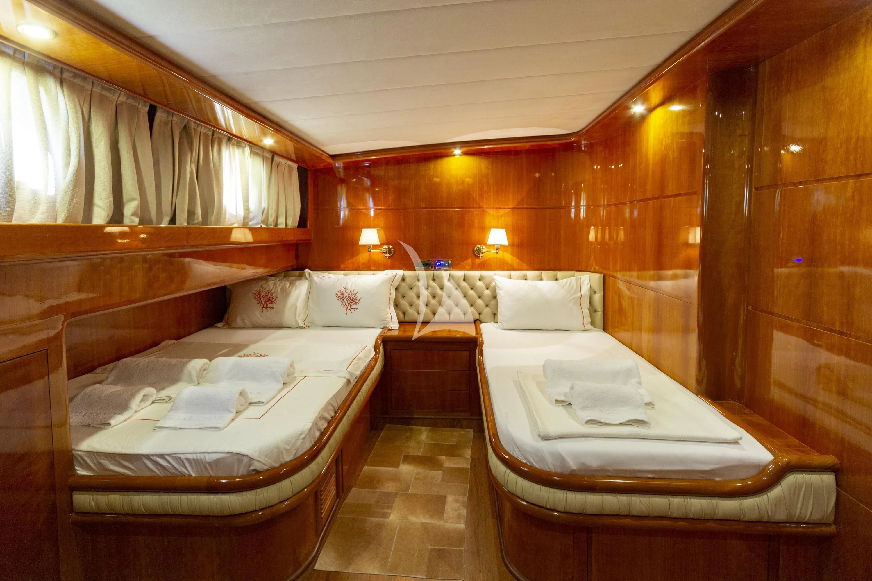 a room with beds and a bed aboard SILVER MOON Yacht for Sale