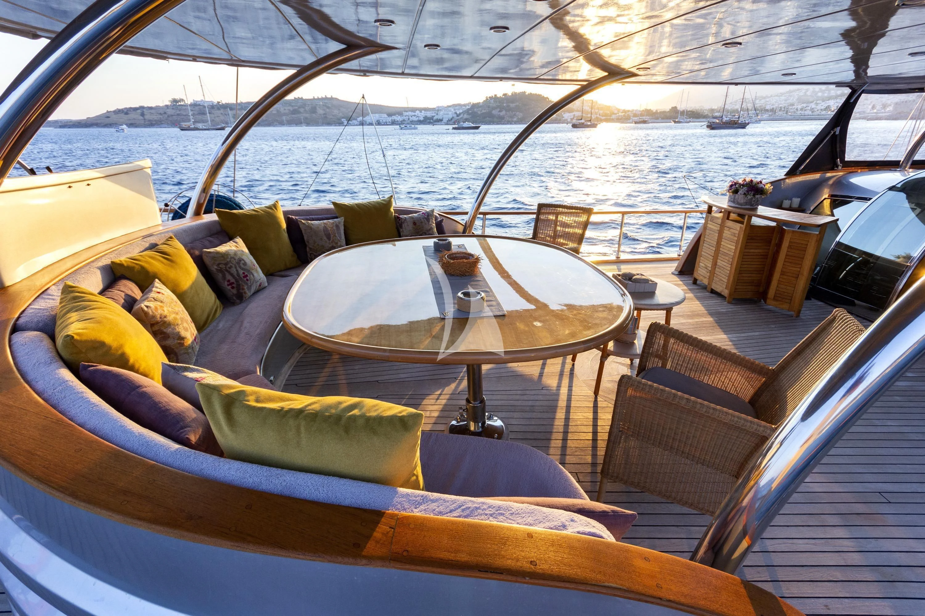 a table with pillows on it aboard SILVER MOON Yacht for Sale