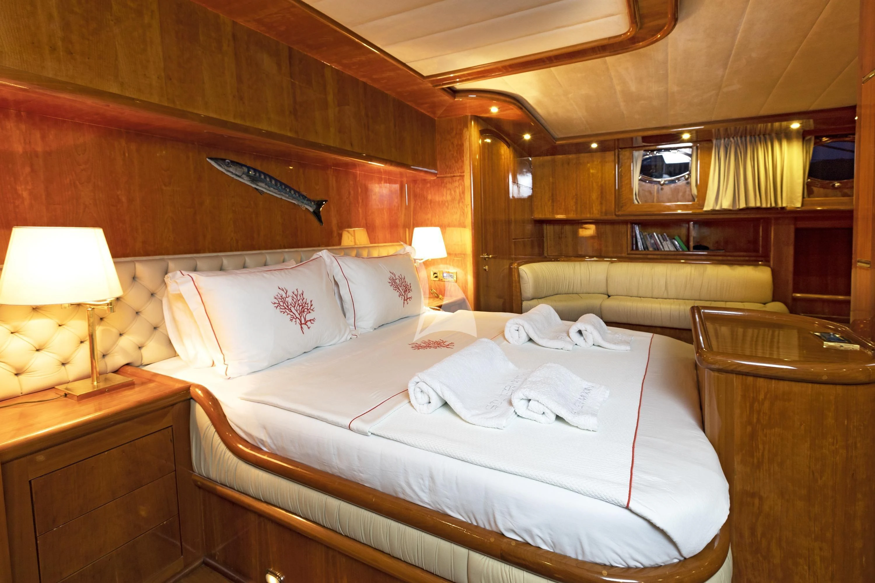 a bed with white sheets aboard SILVER MOON Yacht for Sale