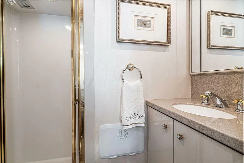 a bathroom with a sink and a mirror aboard ECHOES Yacht for Sale