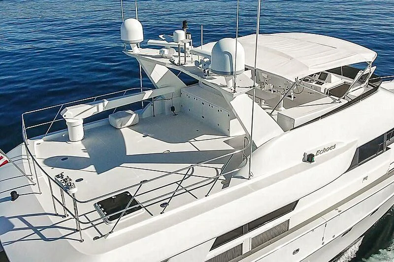 a white boat on the water aboard ECHOES Yacht for Sale
