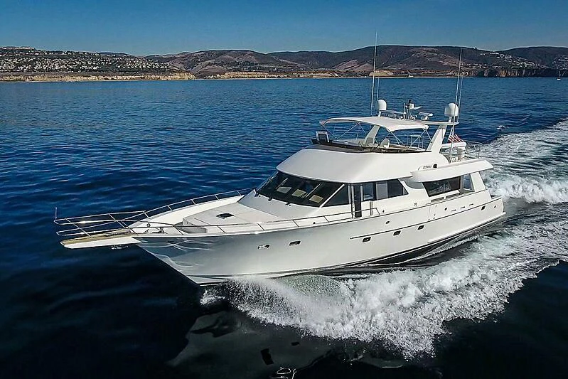 a white yacht on the water aboard ECHOES Yacht for Sale
