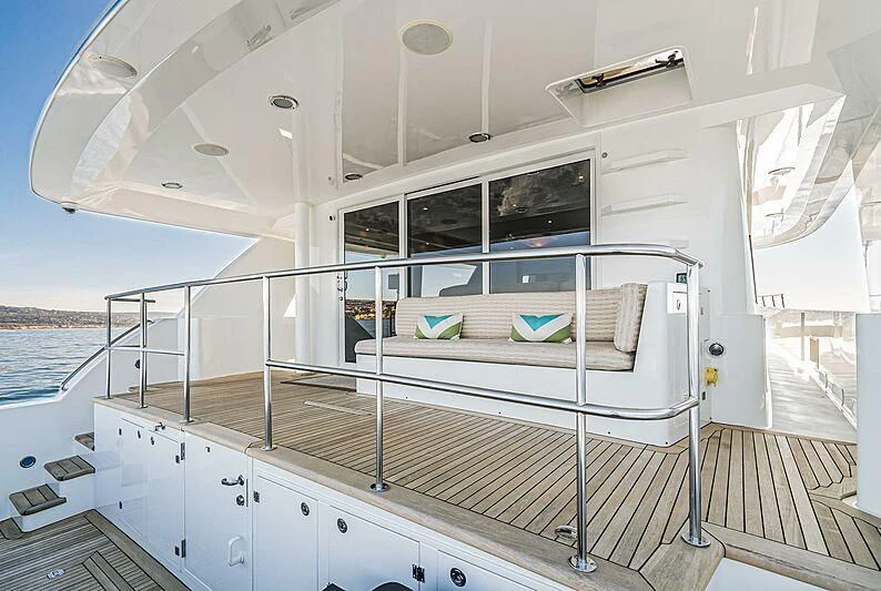 a white bed on a boat aboard ECHOES Yacht for Sale